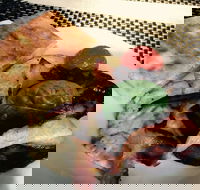 Hungry Wolf's Pizza and Pasta Restaurant - Accommodation Mermaid Beach