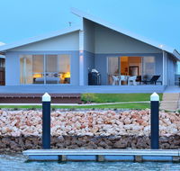The Carnarvon Luxury Canal Home - Accommodation Mermaid Beach